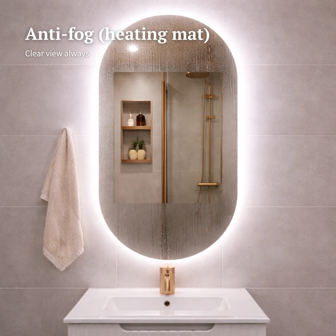 Bathroom with a large oval mirror and an anti-fog heating mat.