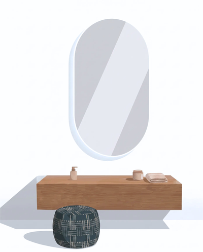A minimalist bathroom vanity setup with a large oval wall mirror, a floating light wood vanity shelf, a patterned pouf, and small toiletry accessories, shown on a clean white background.