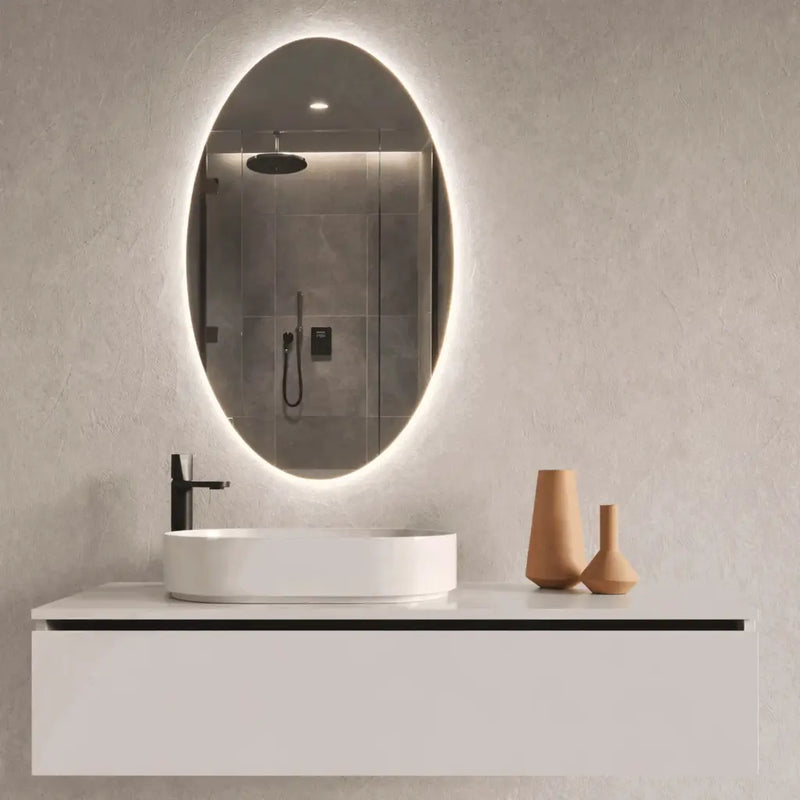 Ovāls LED spogulis ar fona apgaismojumu 600 x 1000 mm